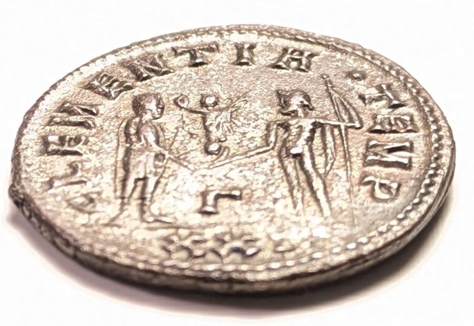 ROME, Carinus, as Augustus  ~ 283-285 AD (284) ~ Silvered Antoninianus (4.14g, 21 mm) ~ Radiate bust right IMP M AVR CARINVS PF AVG. Cyzicus mint ~ Carinus receiving Victory from Jupiter CLEMENTIA TEMP, Γ twixt, XXI in ex ~ SR-12342, RIC-324 ~ GVF