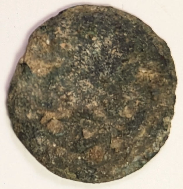 JUDAEA, Porcius Festus, Procurator under ~ Nero. 59-62 ~ Æ Prutah (1.72g) ~ Legend with wreath. (Virtually unreadable) ~ Retrograde legend around palm branch LE KAICAPOC (clear) ~ H-1351e ~ Poor/aVF