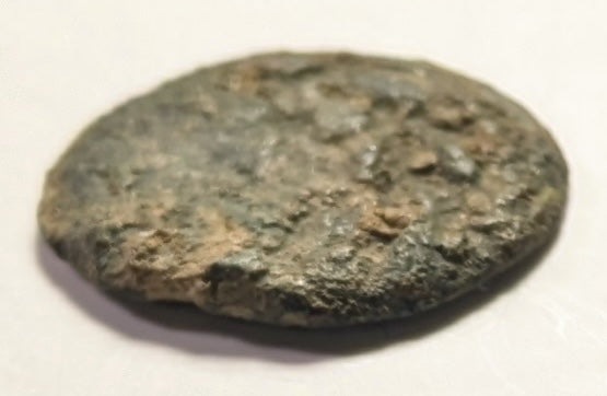 JUDAEA, Porcius Festus, Procurator under ~ Nero. 59-62 ~ Æ Prutah (1.72g) ~ Legend with wreath. (Virtually unreadable) ~ Retrograde legend around palm branch LE KAICAPOC (clear) ~ H-1351e ~ Poor/aVF