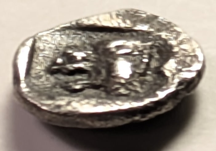 MYSIA, Cyzicus ~ 480-400 BC ~ AR Trihemitartemorion (.29g) ~ Forepart of running boar left, tunny behind ~ Head of lion left, mouth open, in incuse square. Tiny denomination = 3/8 of an obol ~ cf.BMC-120v ~ Toned VF