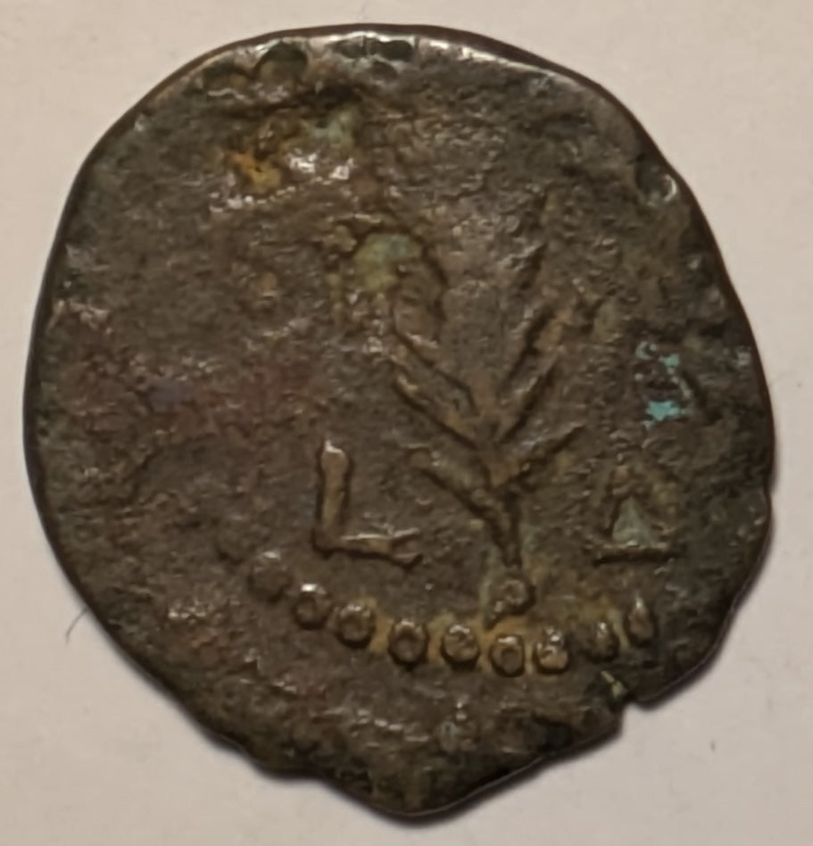 JUDAEA, Valerius Gratus ~ 15-26 AD (yr. 17-18) ~ Æ Prutah (2.32g) ~ TIB KAI CAP in 3 lines in wreath ~ L Δ (year 4) on either side of palm branch ~ H-1338, Sofaer-26 ~ F/VG