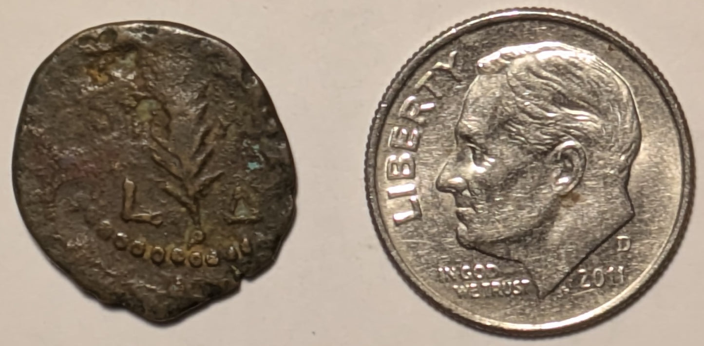 JUDAEA, Valerius Gratus ~ 15-26 AD (yr. 17-18) ~ Æ Prutah (2.32g) ~ TIB KAI CAP in 3 lines in wreath ~ L Δ (year 4) on either side of palm branch ~ H-1338, Sofaer-26 ~ F/VG